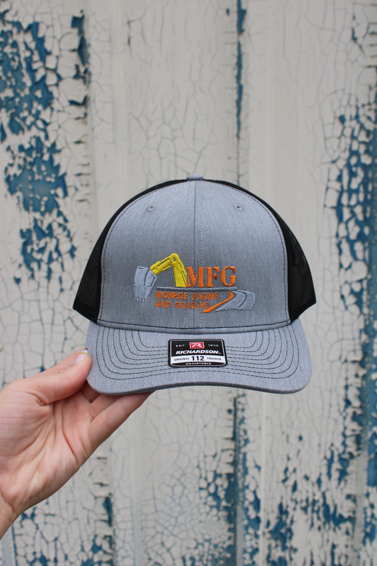 GRAY AND BLACK TRUCKER HAT